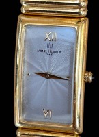 Auktion 361<br>Quartz DAU "Michel Herbelin, Paris" vergoldet, gut erhalten, ohne Batterie