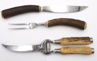 Auktion 361<br>Tranchierbesteck und Geflügelscheren, Eichenlaub gemarkt, Geweihgriffe, ca. L-28cm