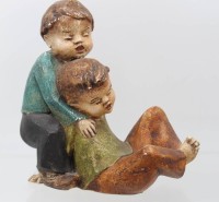 Auktion 361<br>Kinderfigur aus Achatit, Handarbeit, H-22 cm, L-23 cm