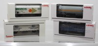 Auktion 361<br>4x div. Güterwaggons mit Werbeaufschriften. Märklin, H0, je in OVP