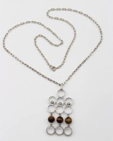 Auktion 361<br>Designanhänger in 835er Silber mit Tigerauge, an 835er Kette, zus.- ca. 14,8gr., L-61cm Anh. 6 x 3cm