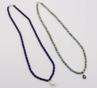 Auktion 361 / Los 1174 <br>2 diverse Halsketten , je Hämatite mit Silberschliesse.
