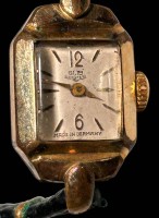 Auktion 362 / Los 2015 <br>mechan. DAU "GUB" Glashütte/Sa an Stoffband, Werk läuft