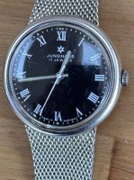 Auktion 362<br>mechan. HAU "Junghans" 17 Jewels, Werk läuft, Stahlband