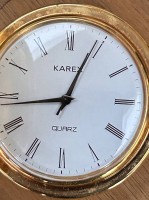 Los 2049 <br>Quartz HTU "Karex", vergoldet und mit Uhrenkette, innen Gravur "Smit  um, 9.4.87" wohl Kegler