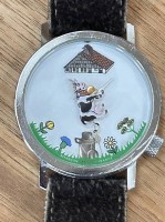 Auktion 362<br>Akteo Quartz Uhr Design JC Mareschal mit Kuh auf Zeiger, Besancon-France, Uhr gut, Band abgenutzt