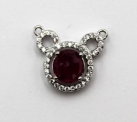 Auktion 362<br>Anhänger mit erhitztem Rubin, versilbert, L-2cm