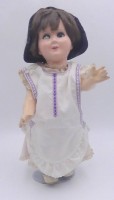 Auktion 363<br>Mädchenpuppe, Massekörper. Kopf Kunststoff, ein Auge defekt, bespielt, H-38 cm, kein Hersteller