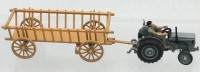 Auktion 363 / Los 12048 <br>Siku Traktor 1470 mit Fahrerfigur und Leiterwagen