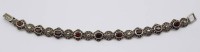 Auktion 363<br>925er Silber-Armband, Granat und Markasiten (einige Steine fehlen), 24,5gr., L-18cm
