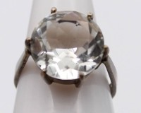 Auktion 363<br>925er Silber-Ring, gr. klarer facett. Stein, ca. 5gr., RG 57