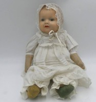 Auktion 363<br>Babypuppe mit Porzellankopf "Armand Marsaille, Nr. 2542/.., Stoffkörper, H-39 cm