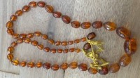 Auktion 363<br>facettierte Bernstein-Kette, verlaufend, ohne Schliesse, L-59 cm, ca. 19 gr