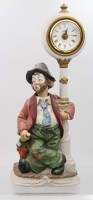 Auktion 363 / Los 16037 <br>Tischuhr mit Spieluhr, Melody in Motion, Funktion nicht geprüft, ca. H-40cm