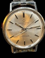Auktion 364<br>HAU "Eterna Matic 2000" Centenaire, Automatik- Werk läuft, Glas mit Kratzer, Metall-Zugband