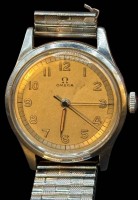 Auktion 364 / Los 2018 <br>mechan. Handaufzug HAU "Omega" verso Gravur, datiert 1949, Zugarmband defekt,