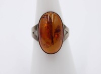 Auktion 364<br>835er Silber-Ring, mit Bernstein-Cabuchon, 2,8gr., RG 55