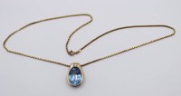 Auktion 364<br>925er Anhänger an Kette, vergoldet, hellblauer Stein, ca. L-48cm, Anh. ca. L-2,3cm, 12,3gr.
