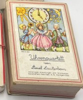 Auktion 364 / Los 12019 <br>Uhrenquartett von Liesel Lauterborn in orig. Schachtel, ASS 606, wohl komplett, aber nicht überprüft