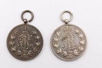 Auktion 364 / Los 7039 <br>2x Friedrich August Medaillen (9)