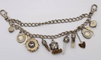 Auktion 364 / Los 2032 <br>jagdl. Uhrenkette, div. Charms, ca. L-32cm