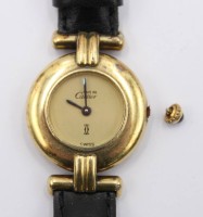 Auktion 364 / Los 2040 <br>Damenarmbanduhr, Must de Cartier, Quarzwerk nicht geprüft, 925er Silber vergoldet, Krone lose anbei, ca. D-2,4cm