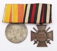 Auktion 364<br>Spange mit Frontkämpfer Kreuz und silberne Vernste Medaille
