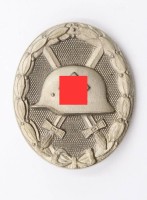 Auktion 364<br>Verwundetenabzeichen in silber, Herst. "107", 3. Reich