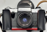 Auktion 364<br>Spiegelreflex "Porst" FX 3 in Ledertasche, guter Zustand