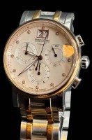 Auktion 365<br>Bruno Söhnle Glashütte Armida  Damenchronograph, Quarzwerk in BS-Ausführung (Basiswerk Ronda 5040.B), Gehäuse Edelstahl, Lünette IP gold, Ø 36 mm, Höhe 12,0 mm, 10 bar, Saphirglas innen entspiegelt, Metallband Edelstahl bicolor IP gold, Faltschließe, 12 Brillanten (WSi-0,6 ct), gut erhalten und läuft