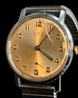 Auktion 365 / Los 2006 <br>mechan HAU "BWC" Swiss (sog. Wehrmachtswerk) um 1965, Werk läuft, Metall Zugband, Glas mit Kratzer, ansonsten gut