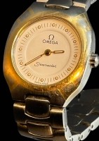 Auktion 371<br>Quartz DAU "Omega" Seamaster" Polaris, orig. Band (Stift fehlt), Werk nicht gepr&uuml;ft, D-2,5 cm, 1x Stift an Armband fehlt, sonst guter Zustand