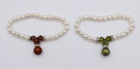 Auktion 365<br>2x Süsswasser-Perlen Zugarmbänder
