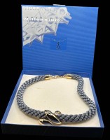 Auktion 365<br>Pierre Lang Millenium 2000, Stoff Halskette mit vergoldeten Flyer, neu in OVP,