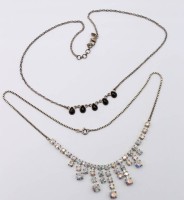 Auktion 365<br>2x div. Silber-Colliers, 1x Strass und 1x Onyx, zus. ca. 20,2gr., L-45cm