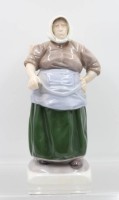 Auktion 365<br>Kai Nielsen (1882 - 1924) - Porzellanfigur Bing &amp; Gröndahl, Fischersfrau, Modellnr. 1702, ca. H-29cm