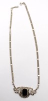 Auktion 365<br>Collier mit einem schwarzen Stein und Markasiten, 925er Silber, L-42cm, 10,5 gr.