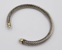 Auktion 365<br>Armreif D.Y. DAVID YURMAN vintage, Gold 585 und Silber 925, 26,2 gr.,mit Perlen an Enden