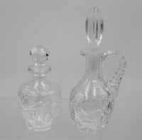 Auktion 365 / Los 10106 <br>kl. Henkelkaraffe und kl. Karaffe, Kristall, ca. H-20 bis 14cm