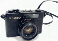 Auktion 366<br>YASHICA Electro 35 GX, mit Tasche &amp; Gebrauchsanweisung, Funktion nicht geprüft, Alters &amp; Gebrauchsspuren