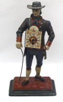 Auktion 366<br>gr. Gusseisernes  Schwarzw&auml;lder Uhrenm&auml;nnchen mit Uhren, wohl Mitte 20.Jhd., H-39 cm