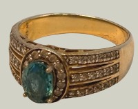 Auktion 366<br>Silberring-925- mit blauen Centerstein und klaren Steinen, Ringschulter vergoldet, RG 60, 5 gr.