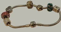 Auktion 366<br>orig. Pandora Armband mit 7 versch. Charms, 33,5 gr.