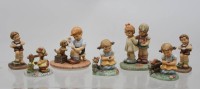 Auktion 367 / Los 8043 <br>7x div. Figuren, Goebel/Hummel, ca. H-11cm