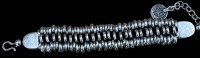 Auktion 367 / Los 1025 <br>T&uuml;rkisches Ethno-Armband, wohl versilbert, mit M&uuml;nze, L-max. 23 cm,  103 gr.