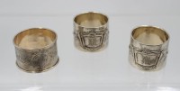 Auktion 367 / Los 11038 <br>3x div. Serviettenringe, 800er Silber, 19. Jhd., je mit Ziermonogramm, ca. D-4,5cm, 77,7gr.