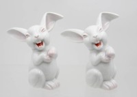 Auktion 367<br>Rosenthal-Porzellanfiguren, lachende Hasen, Entw. Max Hermann Fritz , je leicht farbig staffiert, je ca. H-13cm