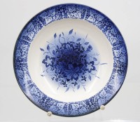Auktion 367<br>tiefer Teller, 19. Jhd., blaues Dekor, cas. D-23,5cm