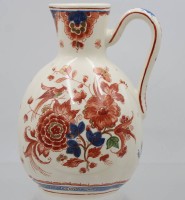 Auktion 367<br>Henkelkrug, Delft, de Fles, polychr. florales Dekor, ca. H-18,5cm