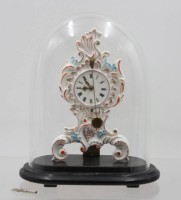 Auktion 367<br>Tischuhr , Porzellan-Zappler, unter Glassturz, Schl&uuml;sselwerk l&auml;uft, ca. H-17cm B-14cm